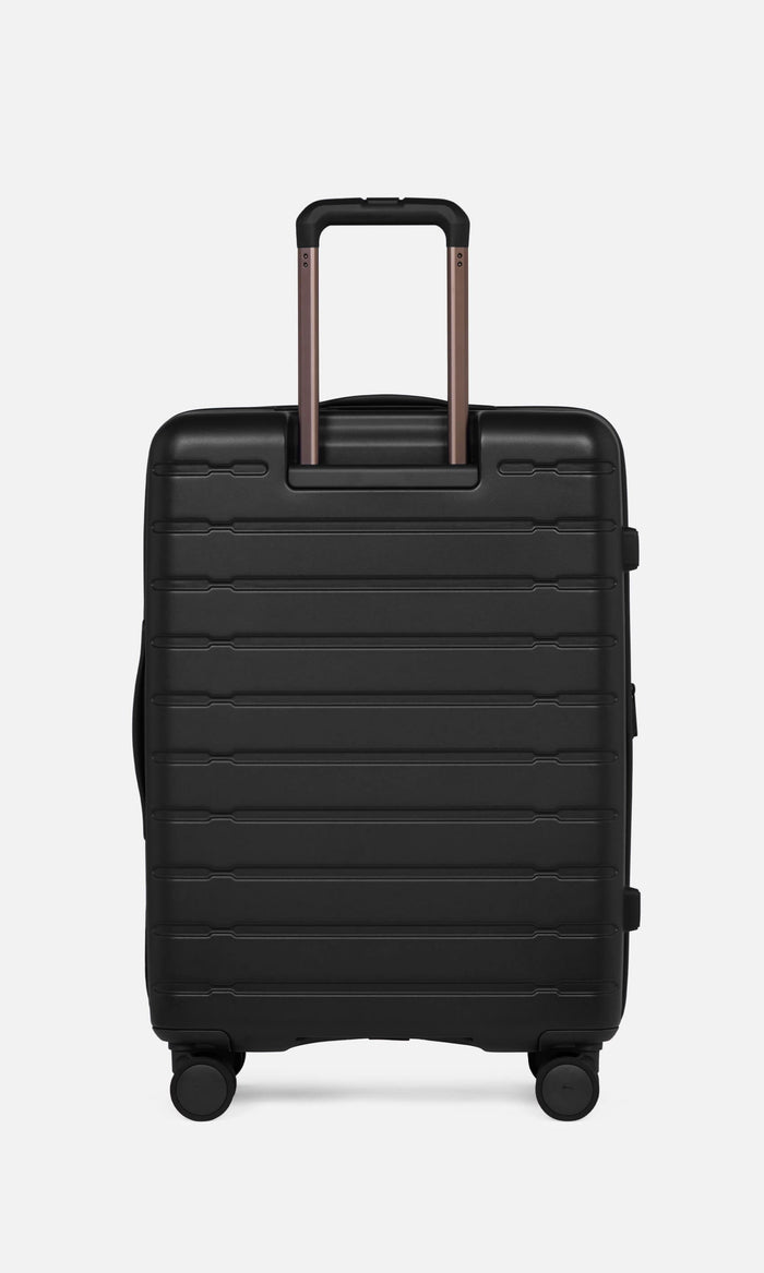 a black suitcase with handles