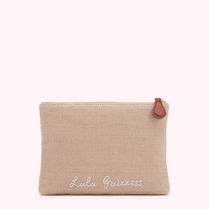 Beige zipper pouch with "Lulu Guinness" embroidered on it.