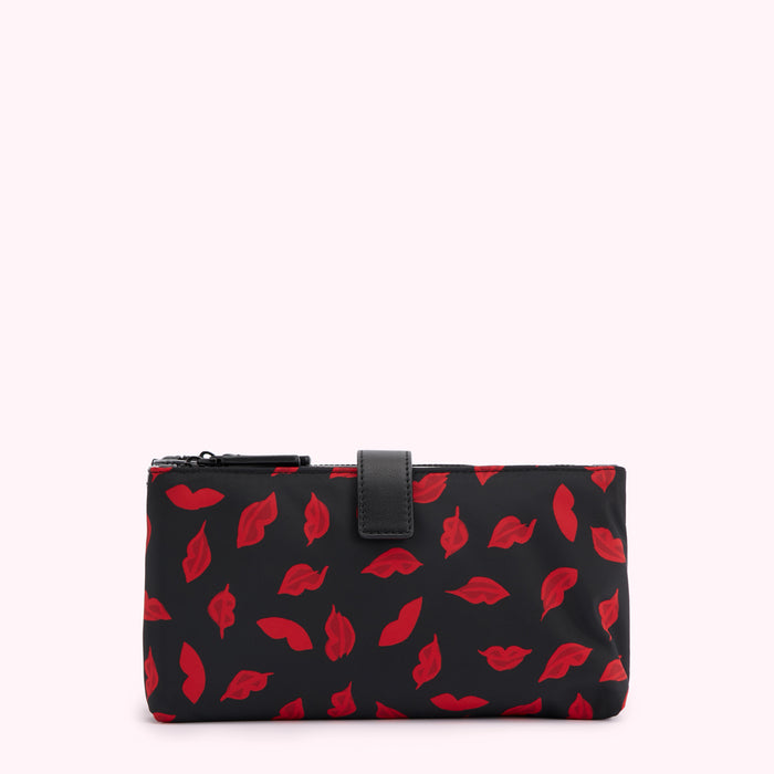 Black pouch with red lips pattern.