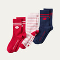 Three pairs of socks in red, pink, and navy on a light gray background