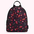 Black backpack with a red and pink lip print.