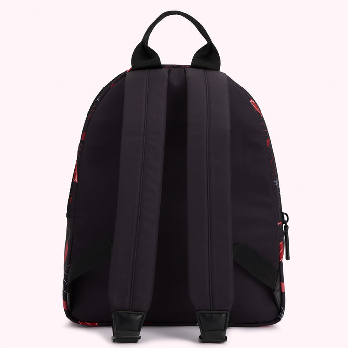 Black backpack with red and white graphic print, shown from the back.