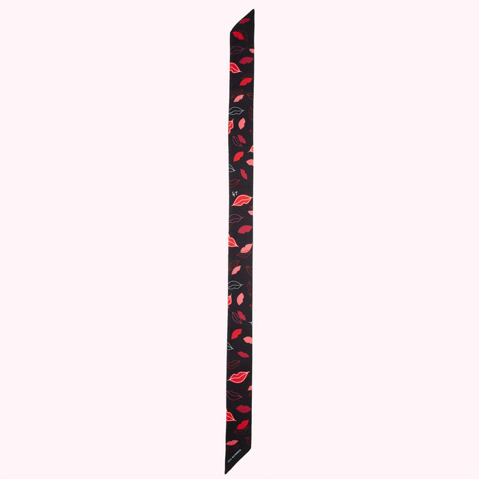 Black silk scarf with a pattern of red lips.