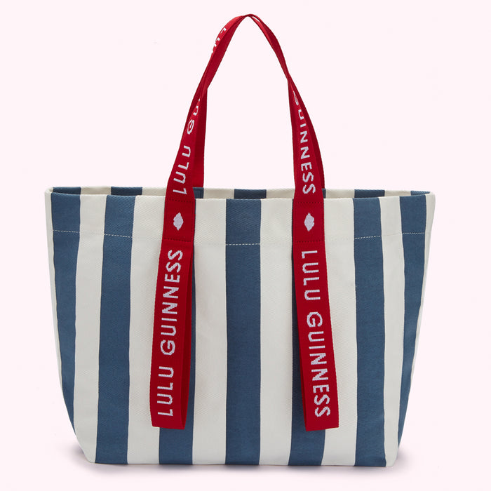 Blue and white striped tote bag with red Lulu Guinness branded straps.