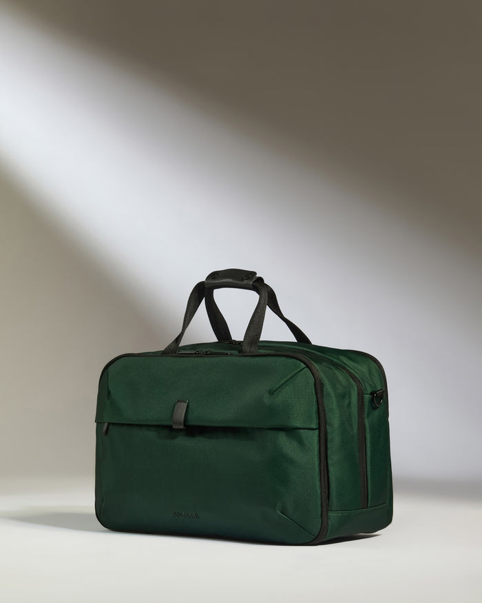 a green bag with a handle