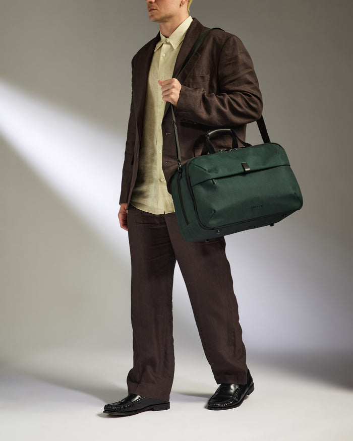 a man holding a bag