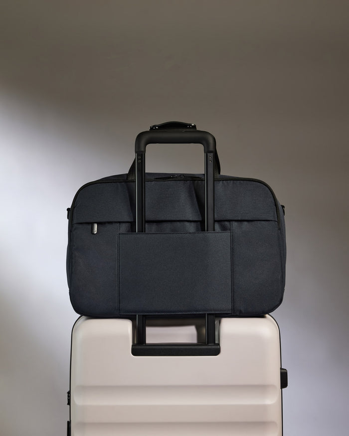 a black and white luggage