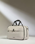 a white bag with black straps