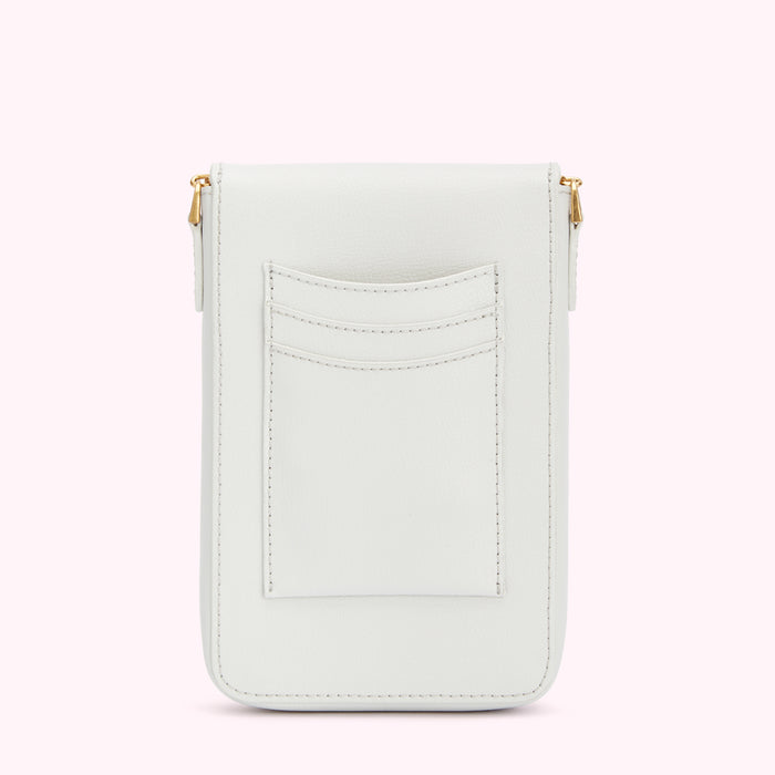 Back view of a white leather crossbody bag with gold hardware and multiple pockets.