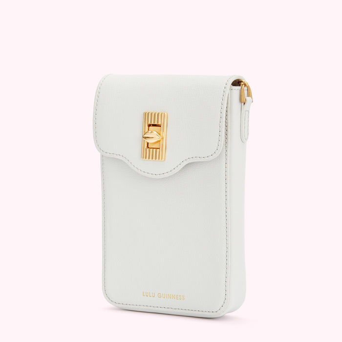 Off-white leather Lulu Guinness crossbody phone bag with gold clasp.