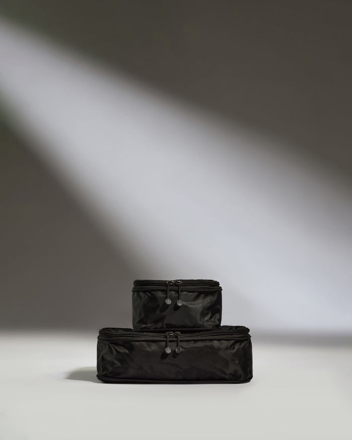 a black bag with zippers