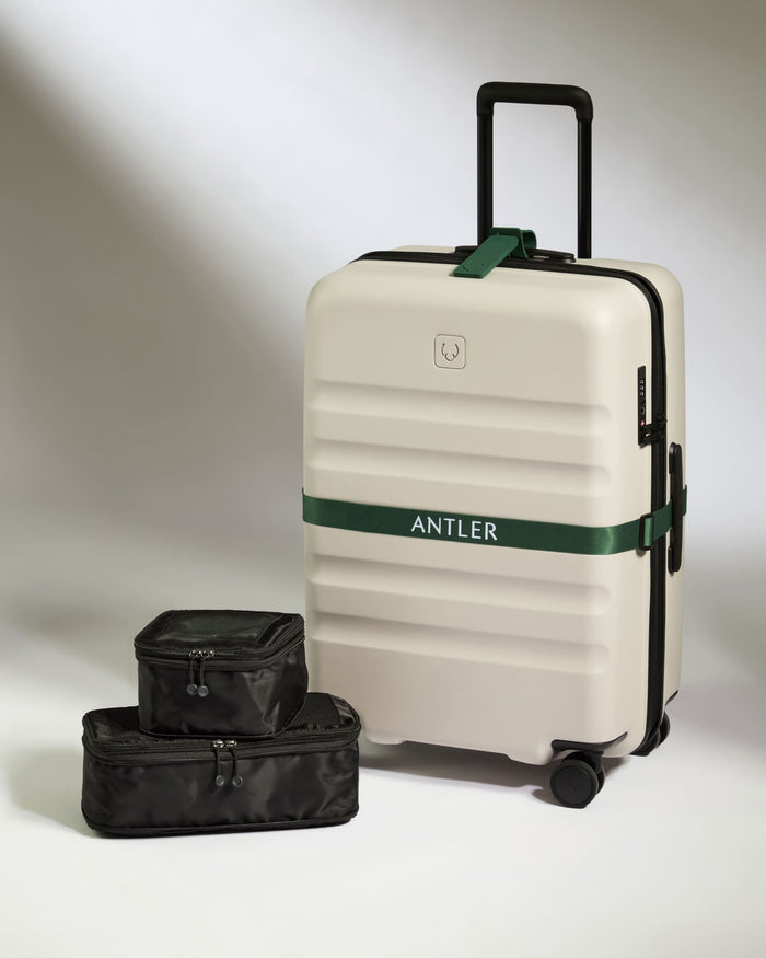 a luggage with a green band around it