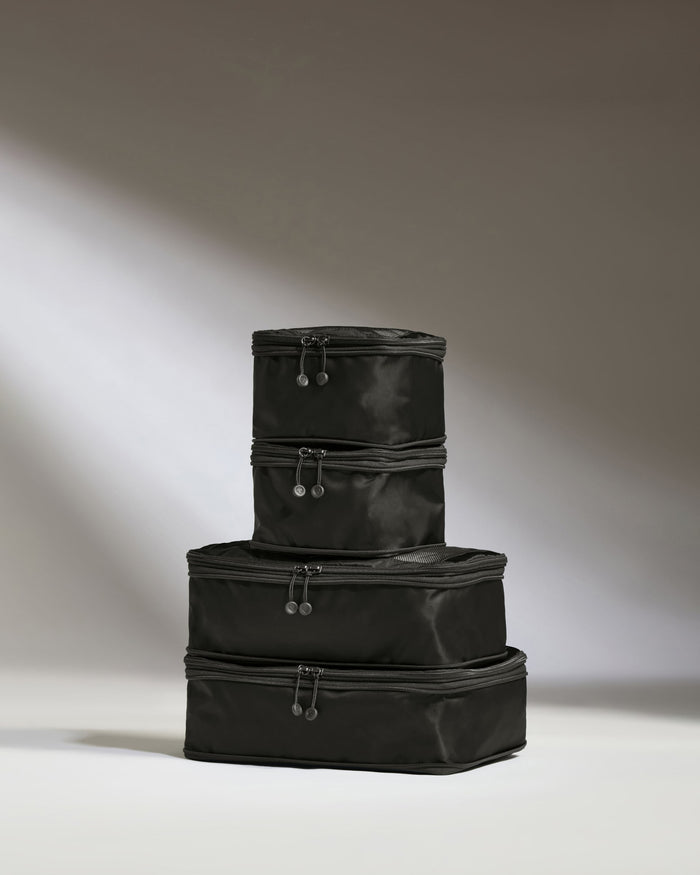 a stack of black bags