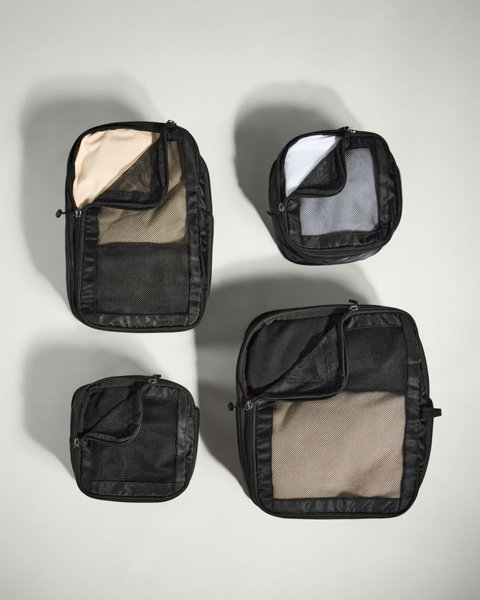several black bags with mesh inside