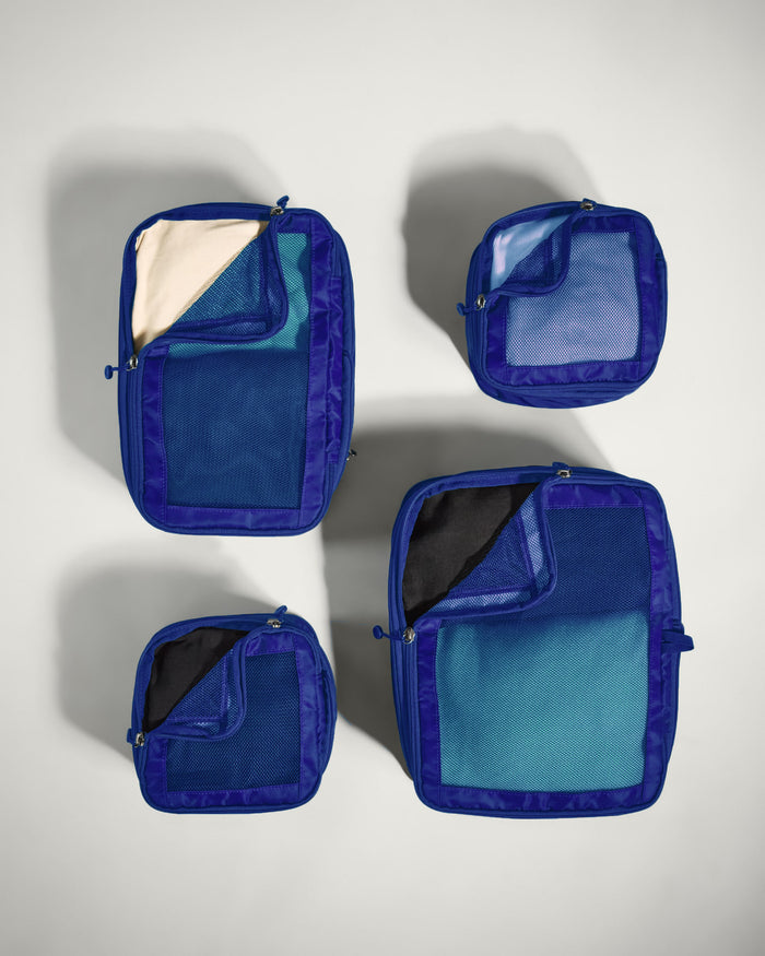 several blue bags with different colors