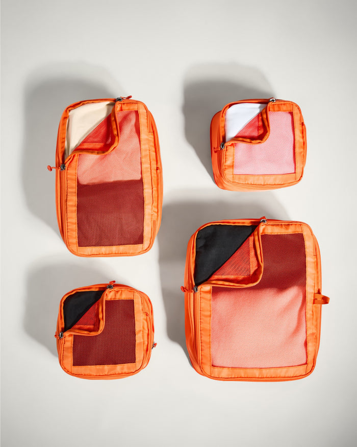 several small orange bags