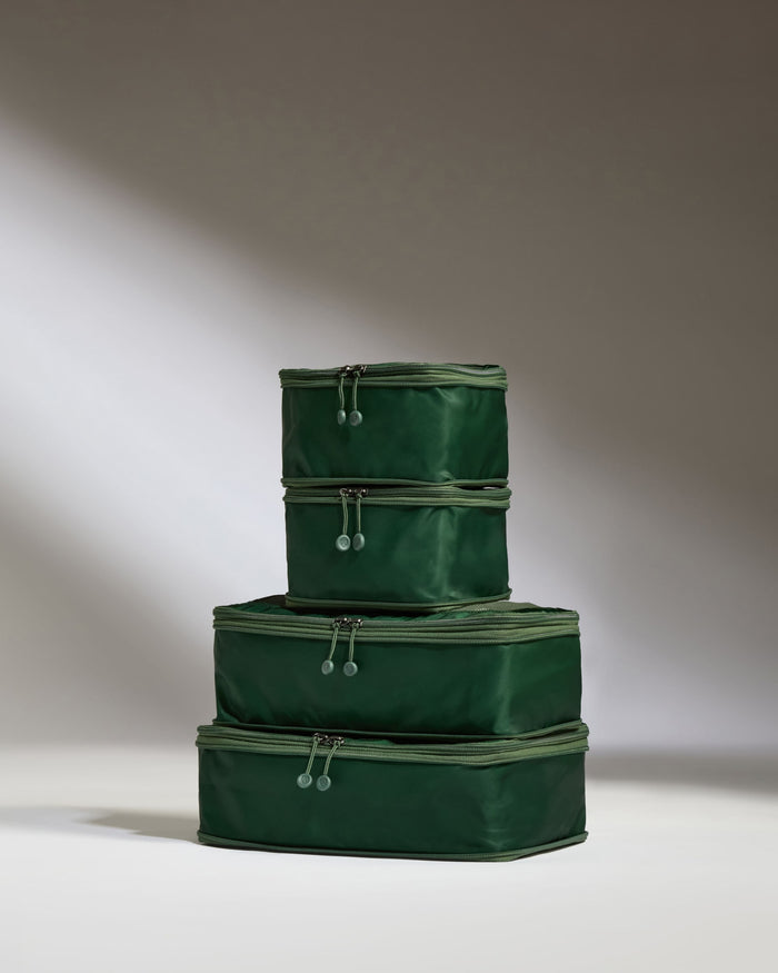 a stack of green bags