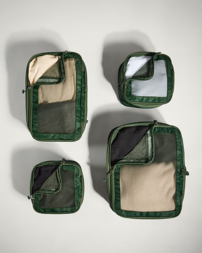 several green bags with mesh inside