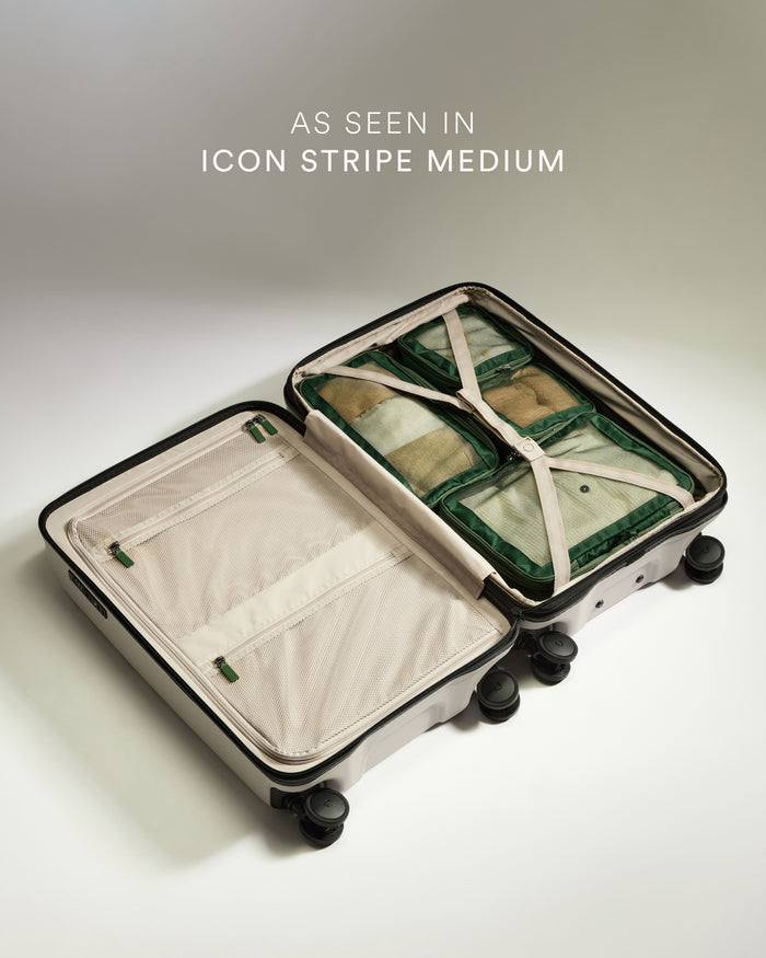a suitcase with a folded item inside
