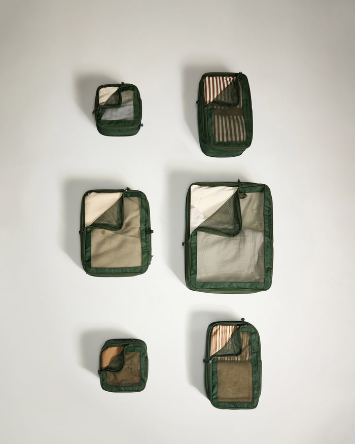 several green and white bags