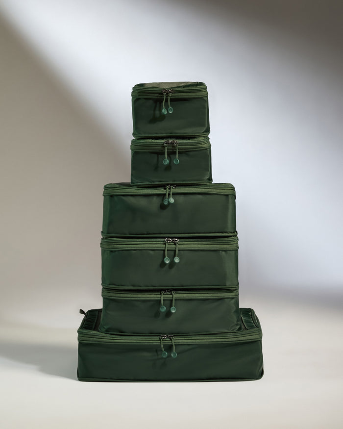a stack of green bags