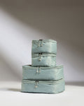 a stack of bags with zippers