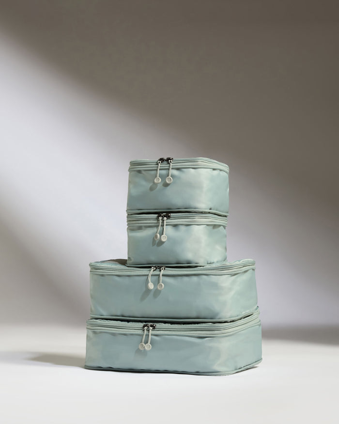 a stack of bags with zippers