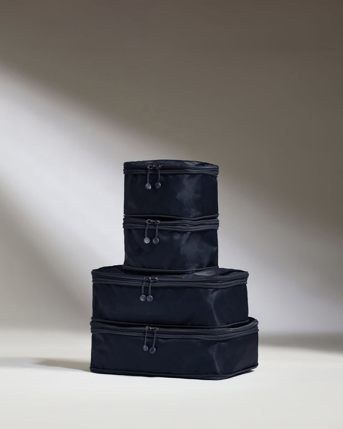 a stack of black bags