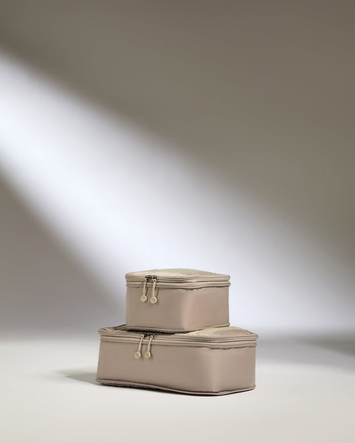 a pair of luggage bags