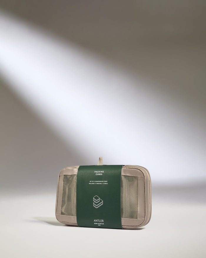 a small rectangular object with a green band