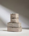 a stack of bags with zippers