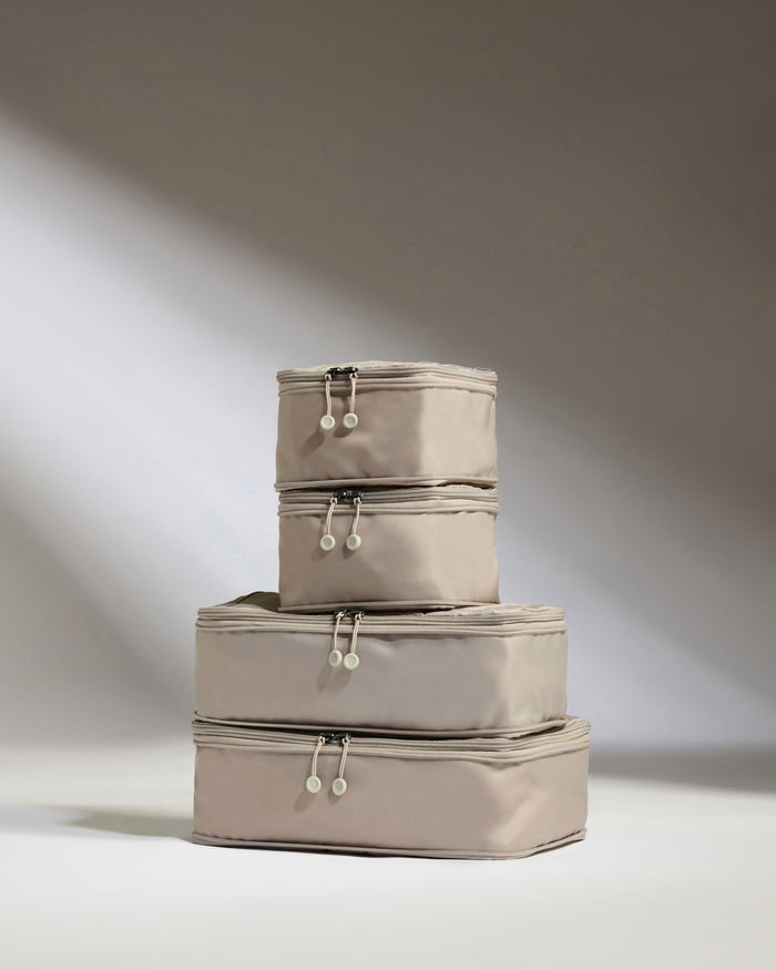 a stack of bags with zippers
