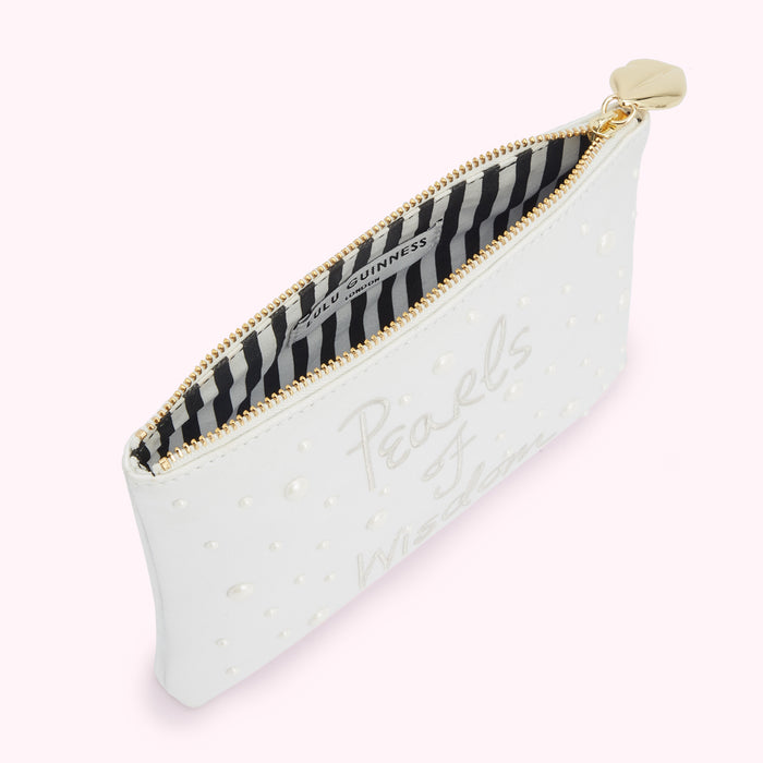 White leather zip pouch with pearls and "Pearls of Wisdom" text. The lining is black and white striped.