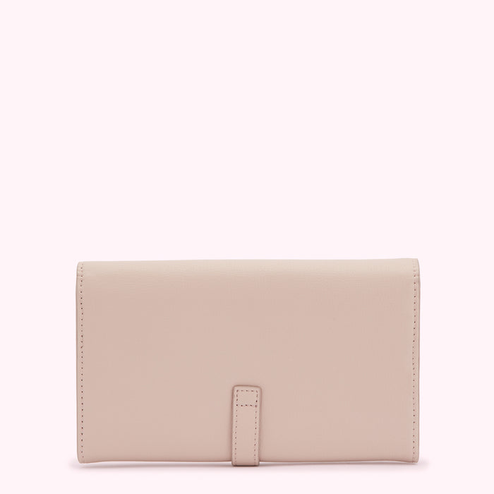 Pale pink leather wallet on a white background.