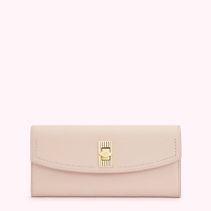 A blush pink leather wallet with a gold clasp.