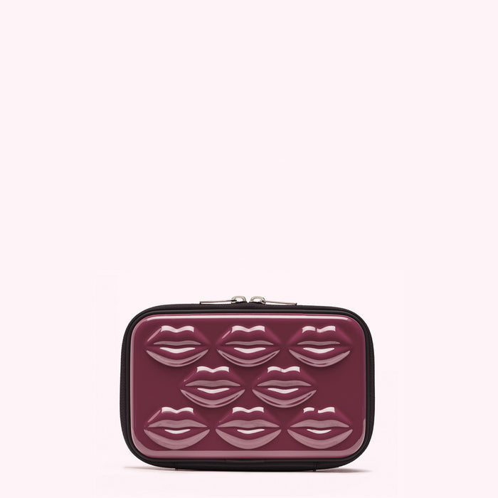 Burgundy rectangular makeup bag with embossed lips.