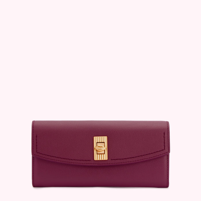 Burgundy leather wallet with gold clasp.