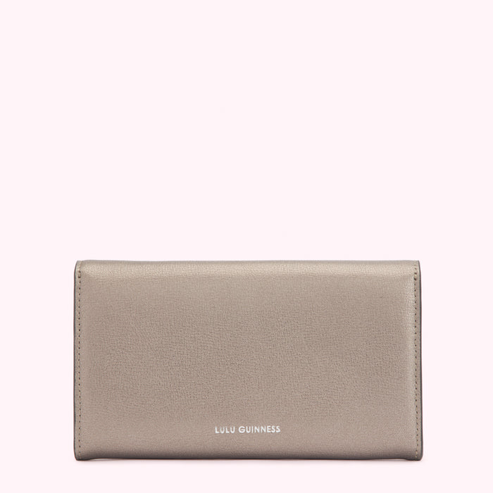 A silver Lulu Guinness wallet on a white background.