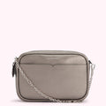 Silver Lulu Guinness crossbody bag with chain strap.