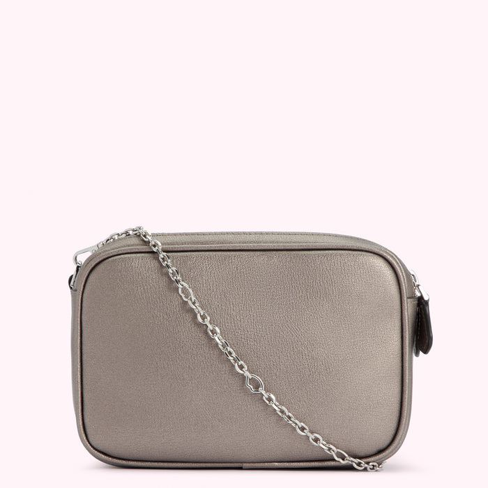 A silver rectangular crossbody bag with a silver chain strap against a white background.