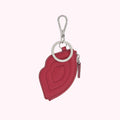 Red leather Lulu Guinness lip-shaped coin purse keychain with silver-tone hardware.