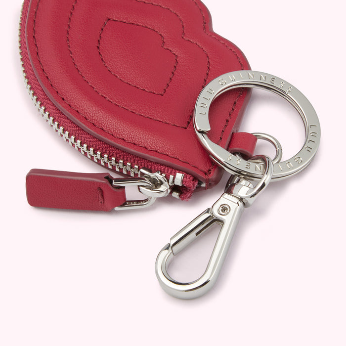 Red Lulu Guinness heart-shaped coin purse keychain with silver-toned hardware.