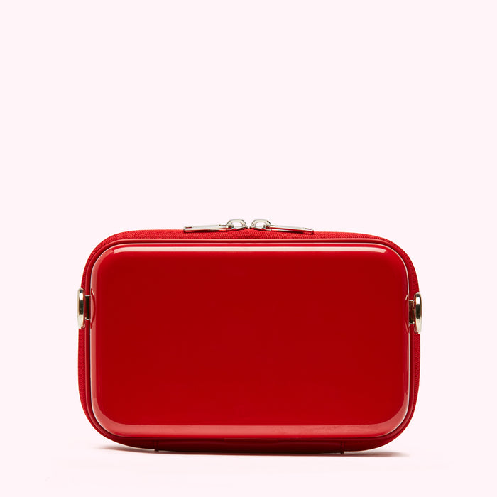 Red rectangular bag with silver zipper.