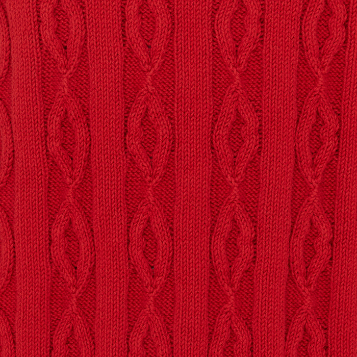 Close-up of red cable knit jumper