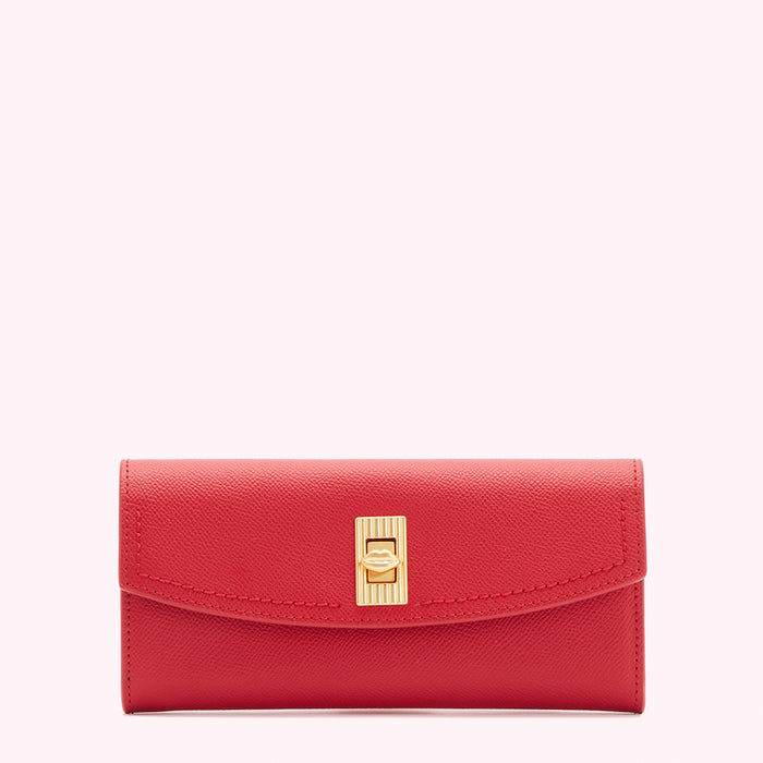 Red leather wallet with gold clasp.