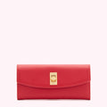 Red leather wallet with gold clasp.