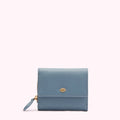 A small, light blue leather wallet with a gold lip-shaped emblem on a white background.