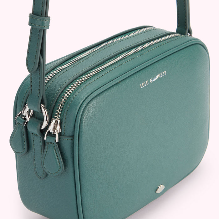 Teal Lulu Guinness crossbody bag with two zippers.