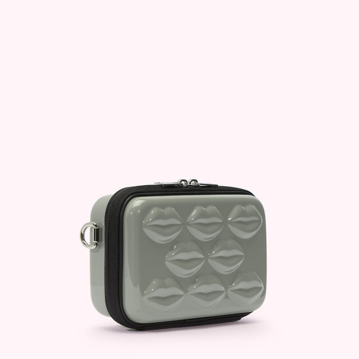 Sage green crossbody bag with embossed lips.