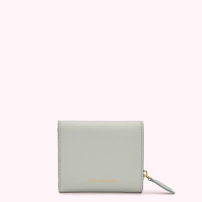 Light teal leather Lulu Guinness wallet with gold zipper.